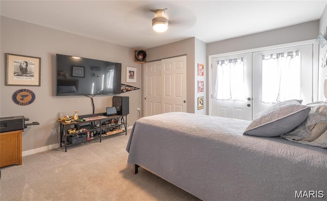 77 Indian Hills Dr, Cuba, MO 65453 - bedroom featuring light colored carpet, a closet, and a ceiling fan