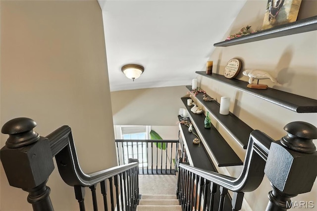 2812 Indiana Ave, Saint Louis, MO 63118 - staircase featuring lofted ceiling