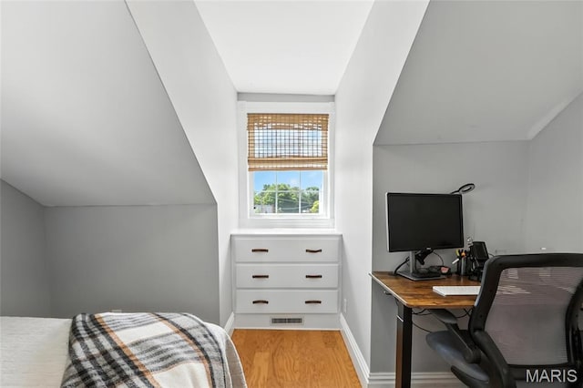 2812 Indiana Ave, Saint Louis, MO 63118 - bedroom with wood finished floors and an office area