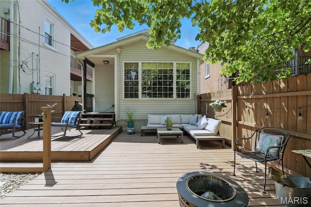 2812 Indiana Ave, Saint Louis, MO 63118 - deck with an outdoor living space with a fire pit