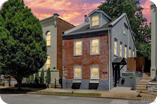 2812 Indiana Ave, Saint Louis, MO 63118 - view of front of property with brick siding and roof with shingles