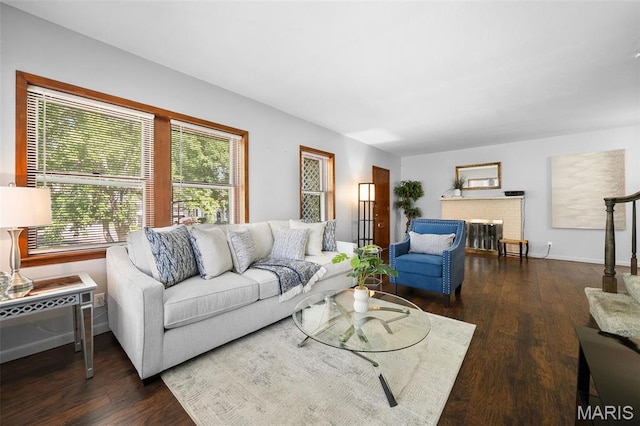 512 N Hills Dr, Saint Louis, MO 63121 - living area with wood finished floors and a brick fireplace