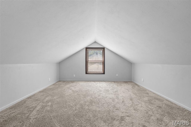 512 N Hills Dr, Saint Louis, MO 63121 - bonus room with lofted ceiling and carpet floors