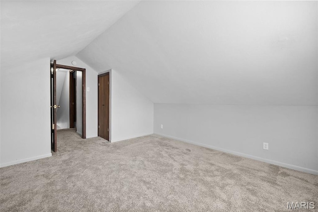 512 N Hills Dr, Saint Louis, MO 63121 - bonus room with carpet flooring and lofted ceiling