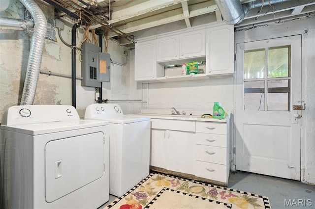 512 N Hills Dr, Saint Louis, MO 63121 - laundry room featuring electric panel, cabinet space, and independent washer and dryer