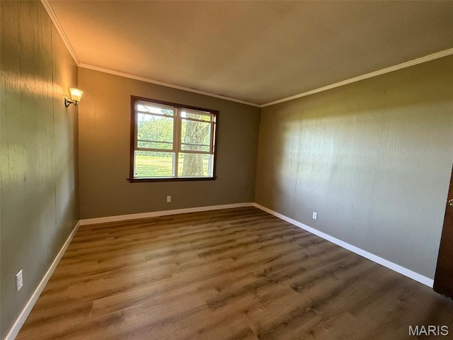 299 E 3050th Ave, Ramsey, IL 62080 - empty room with wood finished floors and ornamental molding