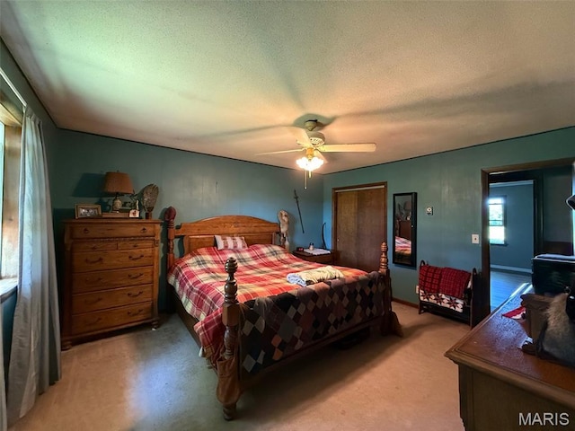 299 E 3050th Ave, Ramsey, IL 62080 - carpeted bedroom featuring a textured ceiling and a ceiling fan