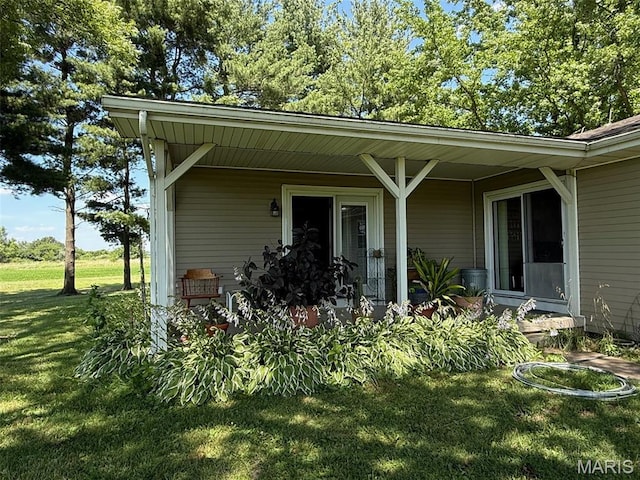 299 E 3050th Ave, Ramsey, IL 62080 - entrance to property featuring a yard and covered porch