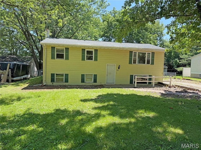 335 Sumac St, Payson, IL 62360 - split foyer home featuring a chimney