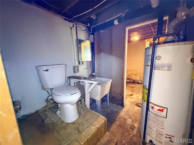335 Sumac St, Payson, IL 62360 - bathroom featuring water heater and concrete floors
