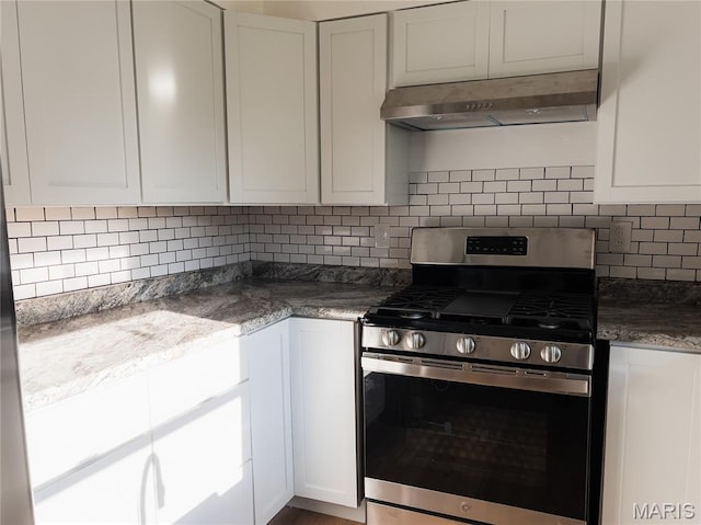 119 Freedom Dr, Belleville, IL 62226 - kitchen featuring stainless steel gas range oven, under cabinet range hood, white cabinets, and tasteful backsplash