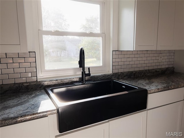 119 Freedom Dr, Belleville, IL 62226 - kitchen with white cabinetry and backsplash