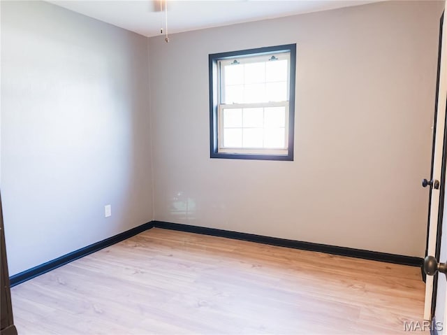 119 Freedom Dr, Belleville, IL 62226 - spare room with light wood-style floors and baseboards
