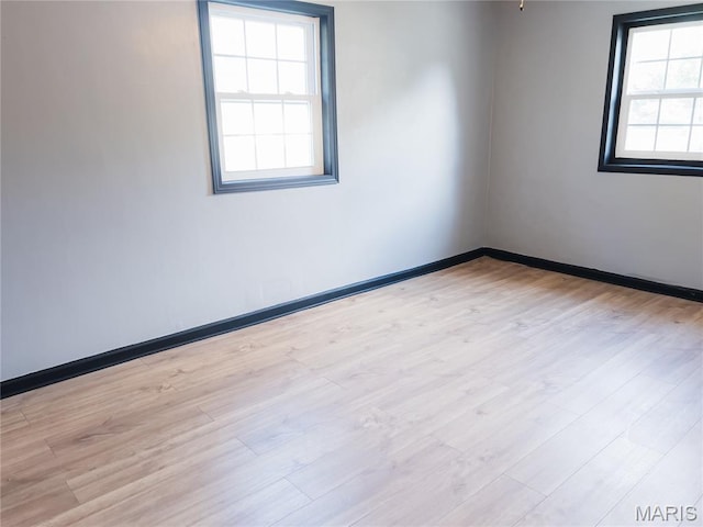 119 Freedom Dr, Belleville, IL 62226 - unfurnished room with light wood-style flooring and baseboards