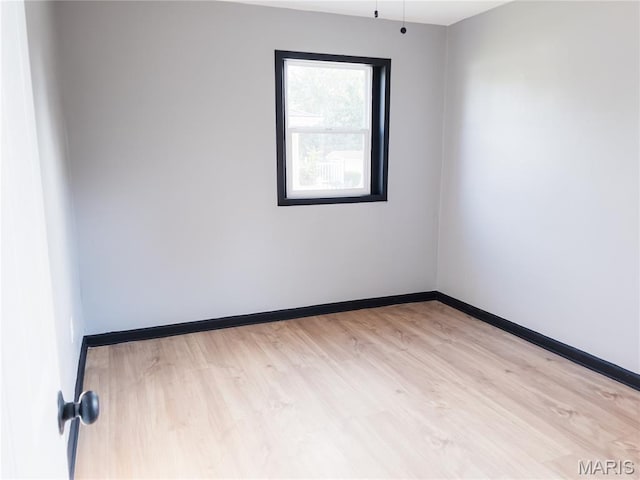 119 Freedom Dr, Belleville, IL 62226 - spare room featuring light wood finished floors and baseboards