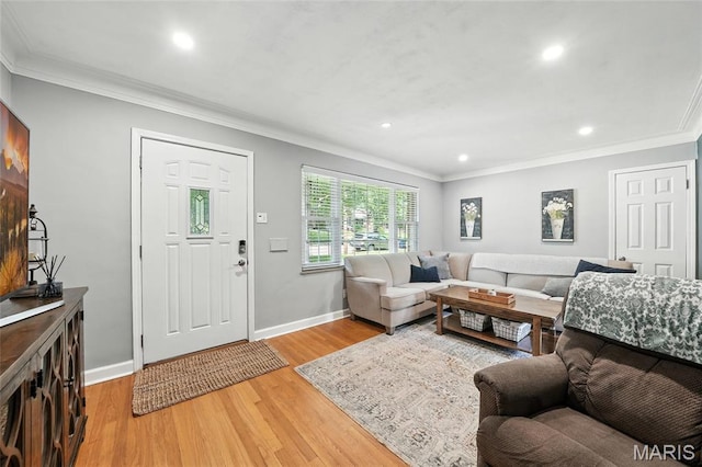 7616 Suffolk Ave, Saint Louis, MO 63119 - living room with ornamental molding, recessed lighting, and light wood finished floors