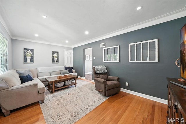 7616 Suffolk Ave, Saint Louis, MO 63119 - living room featuring recessed lighting, light wood-style flooring, and crown molding