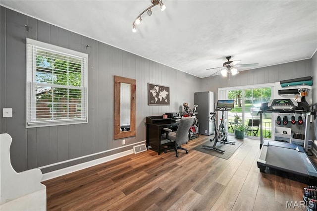 7616 Suffolk Ave, Saint Louis, MO 63119 - office area with wood finished floors and a ceiling fan