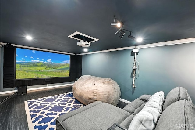 7616 Suffolk Ave, Saint Louis, MO 63119 - cinema room with wood finished floors, recessed lighting, and crown molding