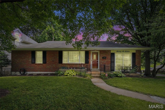 7616 Suffolk Ave, Saint Louis, MO 63119 - ranch-style home featuring brick siding, a front yard, and covered porch
