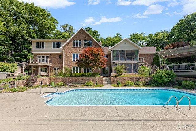 4775 S Hazel Rd, Edwardsville, IL 62025 - outdoor pool with a sunroom and stairs