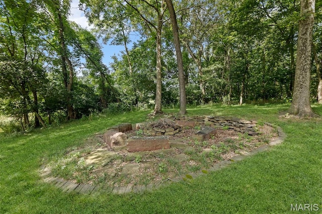 4775 S Hazel Rd, Edwardsville, IL 62025 - view of grassy yard featuring a fire pit