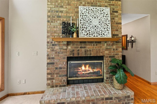 4775 S Hazel Rd, Edwardsville, IL 62025 - detailed view of baseboards and a brick fireplace