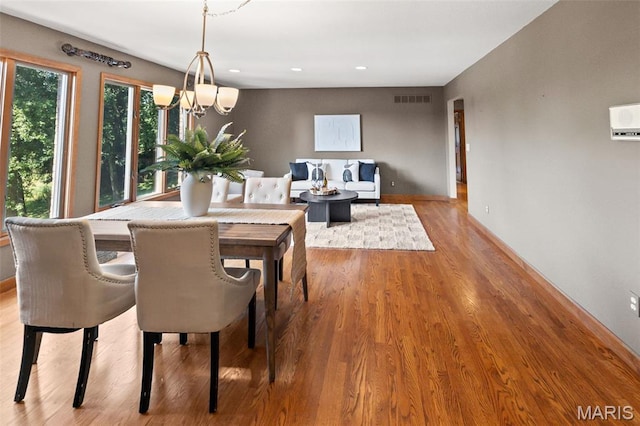 4775 S Hazel Rd, Edwardsville, IL 62025 - dining area featuring a chandelier, wood finished floors, and recessed lighting