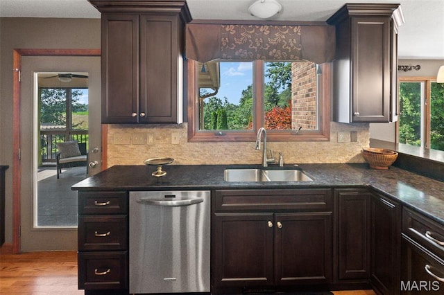 4775 S Hazel Rd, Edwardsville, IL 62025 - kitchen featuring dishwasher, dark brown cabinetry, tasteful backsplash, wood finished floors, and dark stone countertops
