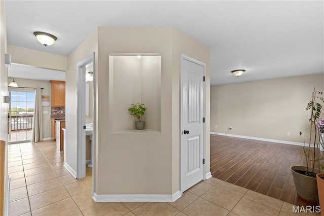 672 Berrywine Ln, Arnold, MO 63010 - corridor with light tile patterned floors and baseboards