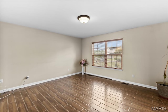 672 Berrywine Ln, Arnold, MO 63010 - unfurnished room featuring wood tiled floors and baseboards