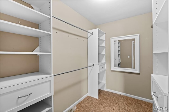 672 Berrywine Ln, Arnold, MO 63010 - walk in closet featuring light colored carpet