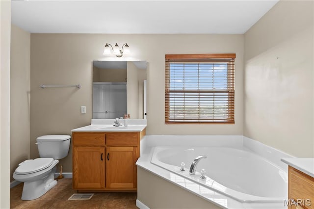 672 Berrywine Ln, Arnold, MO 63010 - bathroom with vanity, a garden tub, and tile patterned flooring