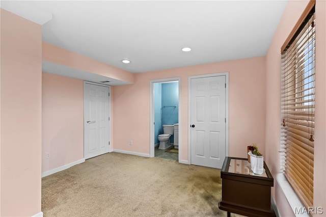 672 Berrywine Ln, Arnold, MO 63010 - unfurnished bedroom featuring carpet, recessed lighting, and ensuite bathroom