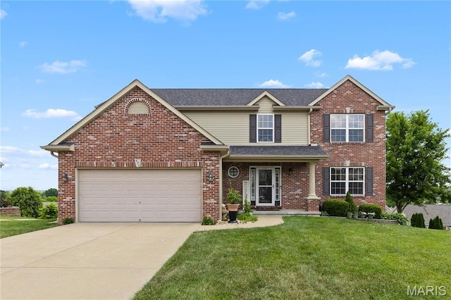 672 Berrywine Ln, Arnold, MO 63010 - view of front facade with a front yard, concrete driveway, a garage, and brick siding