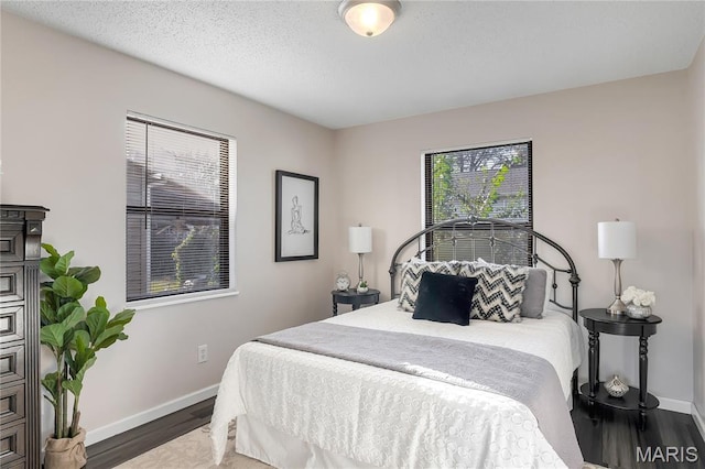 8219 Pear Ln, Saint Louis, MO 63123 - bedroom featuring wood finished floors and baseboards