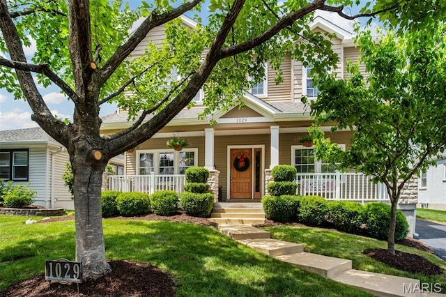 1029 Brownell Ave, Glendale, MO 63122 - view of front of home with covered porch and a front lawn