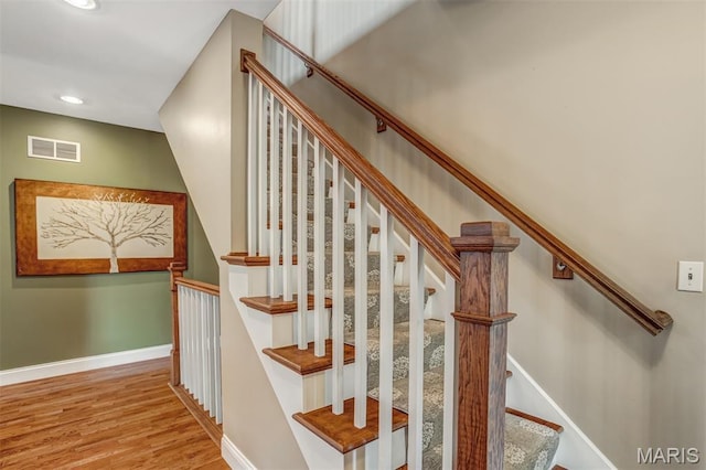 1029 Brownell Ave, Glendale, MO 63122 - stairway with wood finished floors and recessed lighting