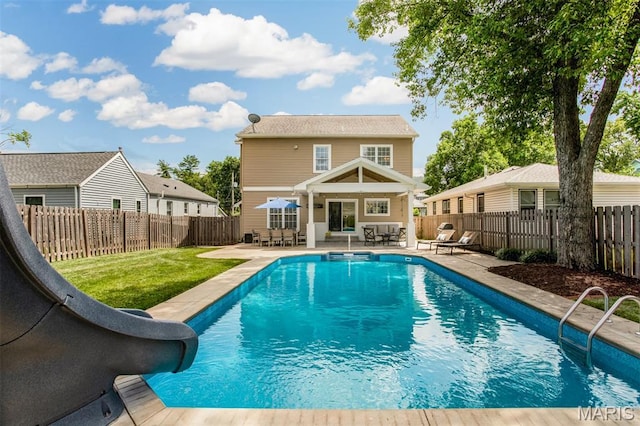 1029 Brownell Ave, Glendale, MO 63122 - view of pool with a patio, a fenced backyard, a water slide, and outdoor dining area