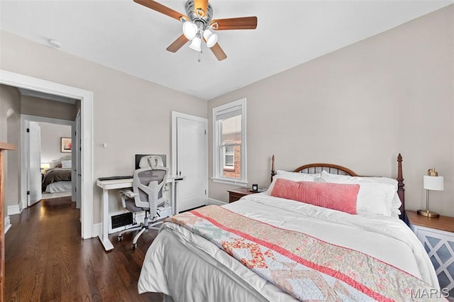 6016 Scanlan Ave, Saint Louis, MO 63139 - bedroom with wood finished floors, ceiling fan, and an office area