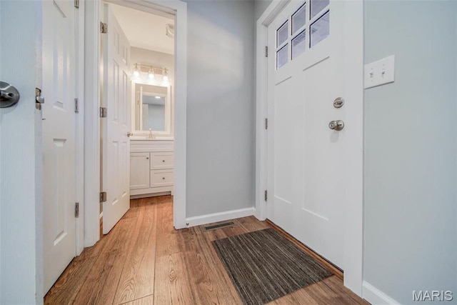 11880 County Road 3040, Rolla, MO 65401 - entryway featuring wood finished floors