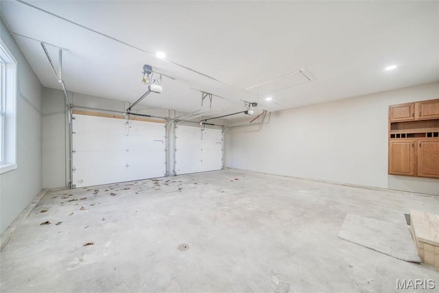 11880 County Road 3040, Rolla, MO 65401 - garage featuring a garage door opener and recessed lighting
