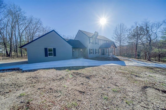11880 County Road 3040, Rolla, MO 65401 - back of property featuring a chimney