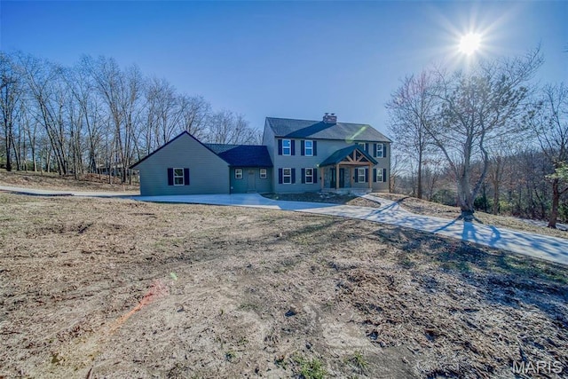 11880 County Road 3040, Rolla, MO 65401 - rear view of property featuring a chimney