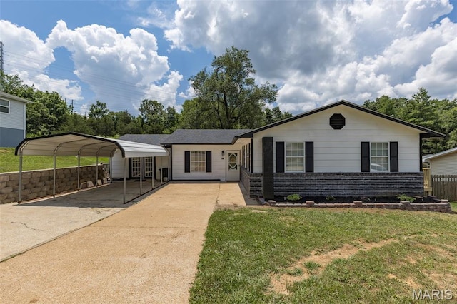 211 Congress St, Park Hills, MO 63601 - single story home with driveway, a carport, and brick siding
