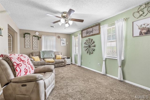 211 Congress St, Park Hills, MO 63601 - carpeted living room with a textured ceiling and a ceiling fan