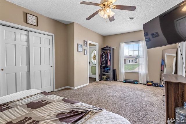211 Congress St, Park Hills, MO 63601 - bedroom with carpet floors, a textured ceiling, a closet, and a ceiling fan