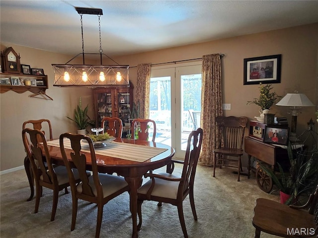 310 E 1st St, Ramsey, IL 62080 - dining area featuring carpet flooring