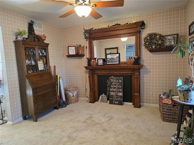310 E 1st St, Ramsey, IL 62080 - living room with carpet, ceiling fan, and wallpapered walls