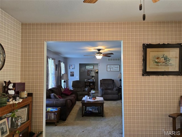 310 E 1st St, Ramsey, IL 62080 - carpeted living area with ceiling fan and wallpapered walls